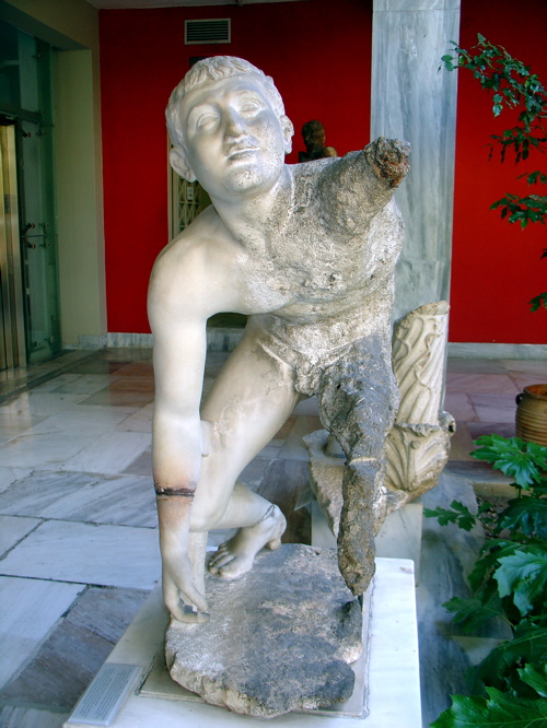 Crouching boy c. Jo Marchant